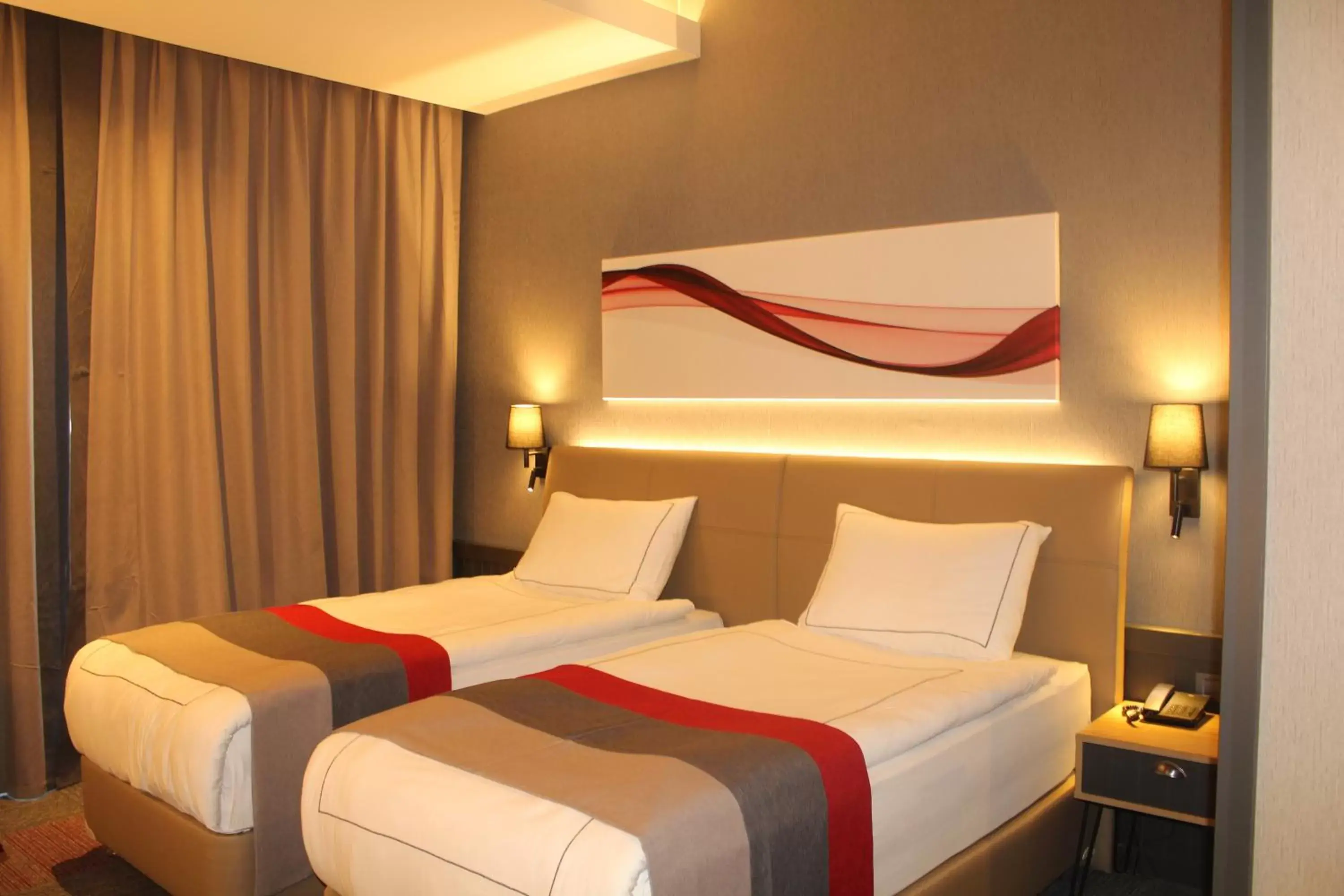 Bedroom in Ramada By Wyndham Tire